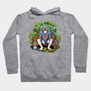 A serene scene of a Physician English Bulldog taking a break in a peaceful park Hoodie